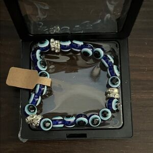 Blue Evil Eye Stretch Bracelet with Silver Accents